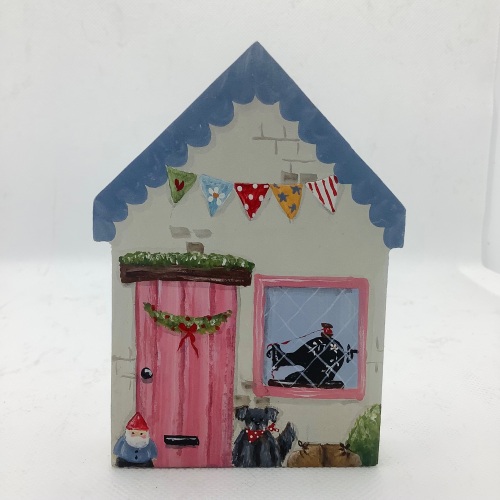 A small house - gnome a d dog