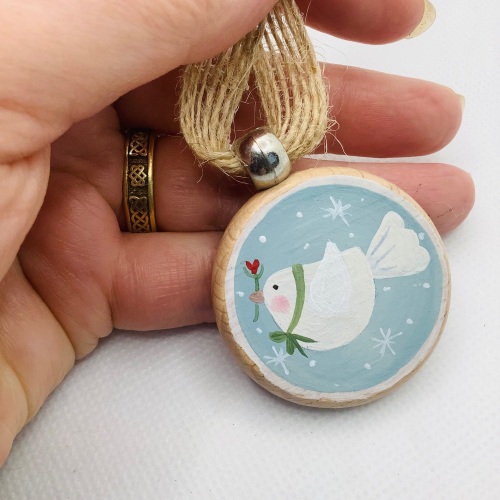 A wooden Christmas decoration- dove