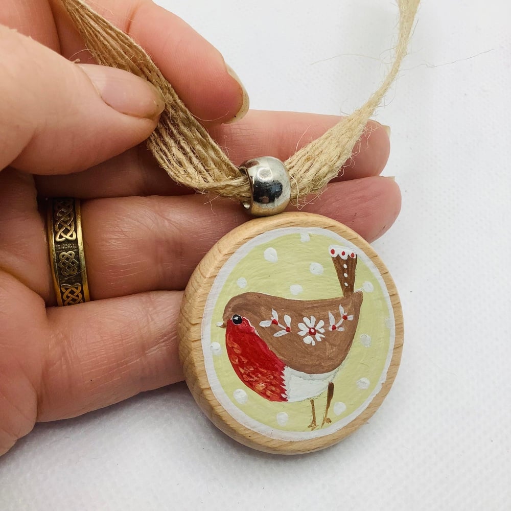 A wooden Christmas decoration- robin