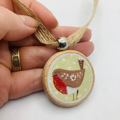 A wooden Christmas decoration- robin