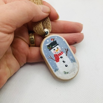 A wooden Christmas decoration- snowman