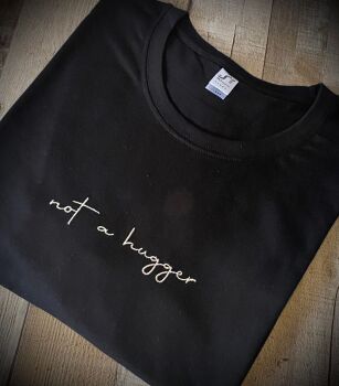 Not a Hugger Embroidered T Shirt