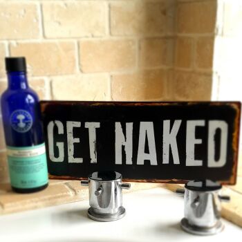 Get Naked plaque