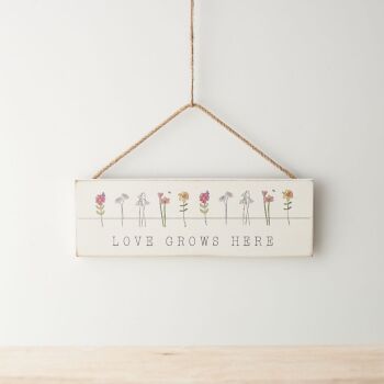 Love Grows Here Sign