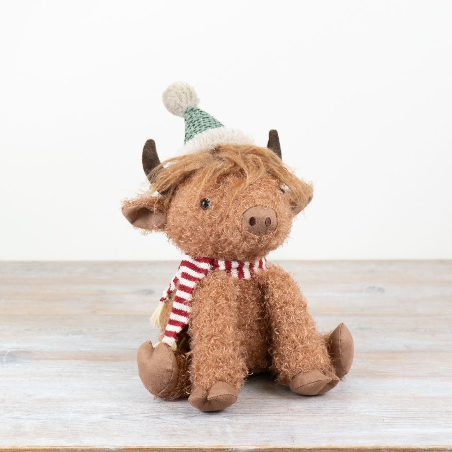 Sitting Highland Cow