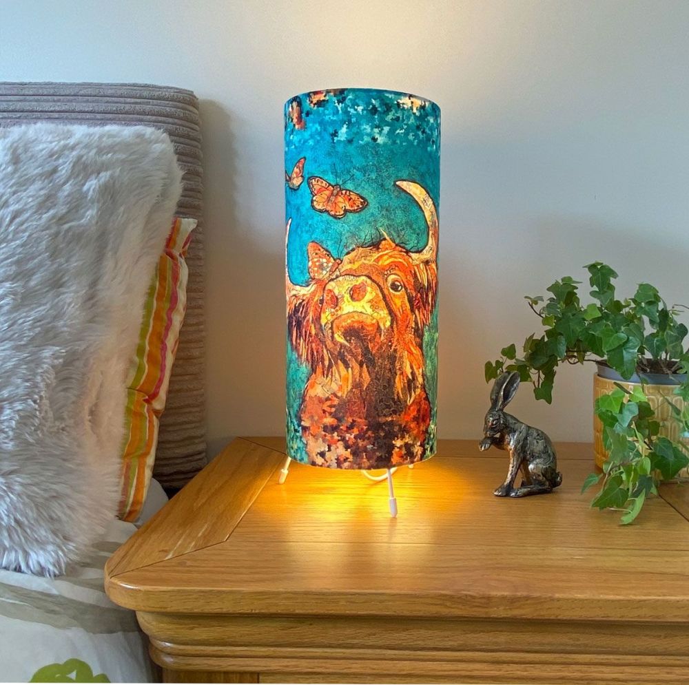 Highland Cow Cylinder Table Lamp switched on