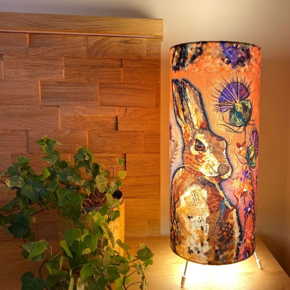 Hare & Thistle Cylinder Table Lamp switched on