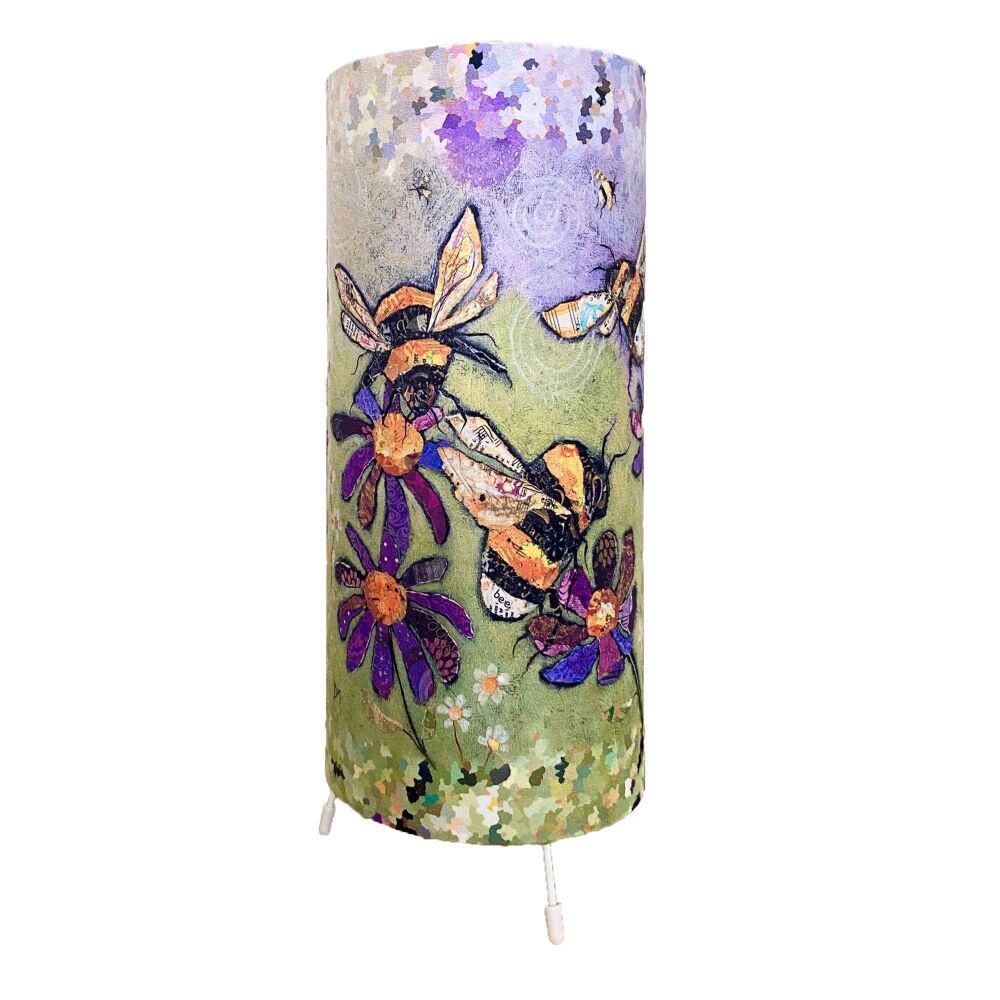 Humble Bumbles Cylinder Table Lamp on purple, yellows and greens