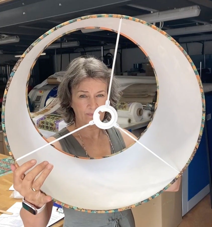 dawn maciocia looking through a lampshade she just made