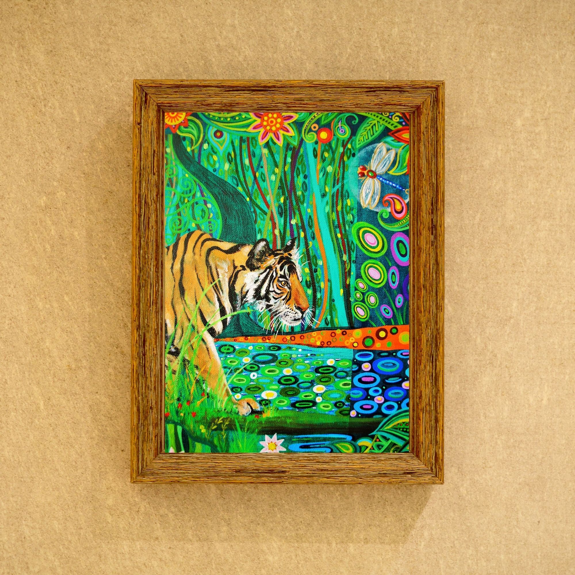 Colourful Tiger art print, downloadable and printable at home, in a portrait wood effect frame (not available to purchase)