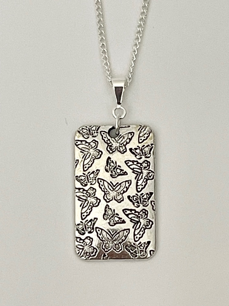 Butterfly ‘dog tag’ pendant
