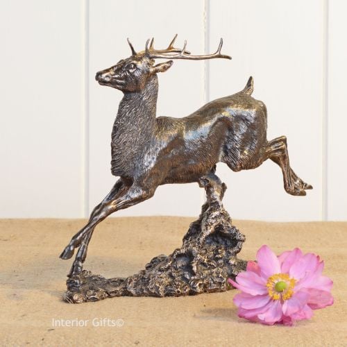 Bronze Sculpture of Majestic Jumping Stag