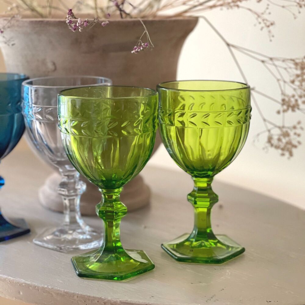 Coloured glass wine goblet in green, beautifully sculpted design ...