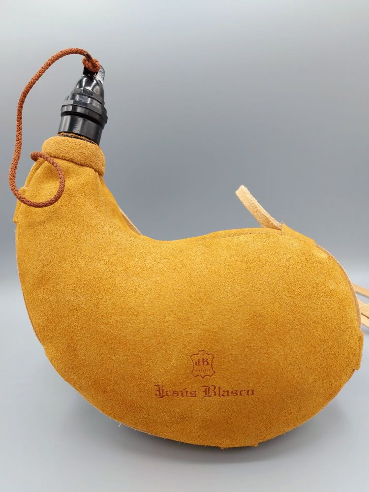 Basque style goatskin bota bags. Leather wine botas