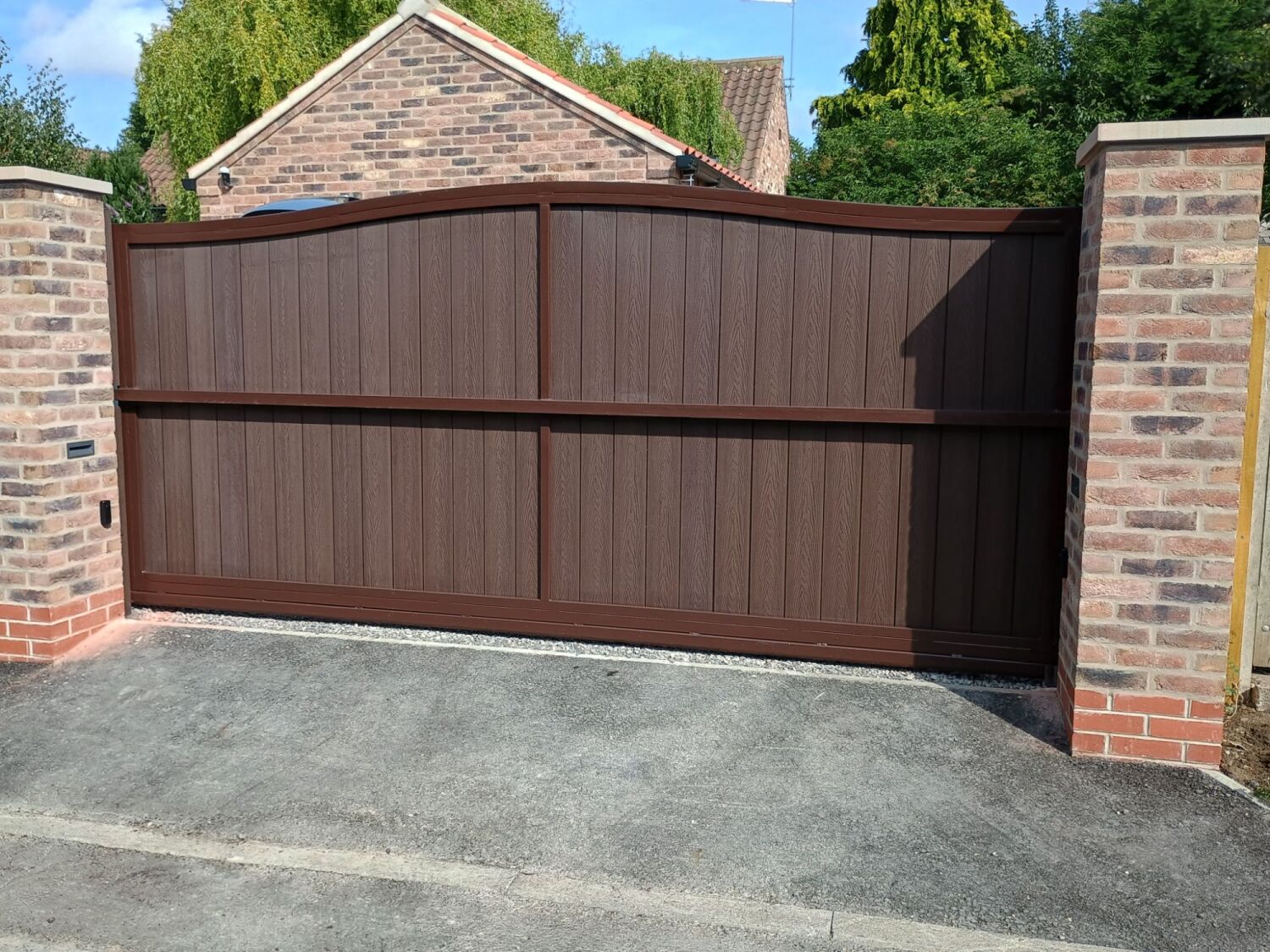 York Gates automated cantilever sliding gate curved top