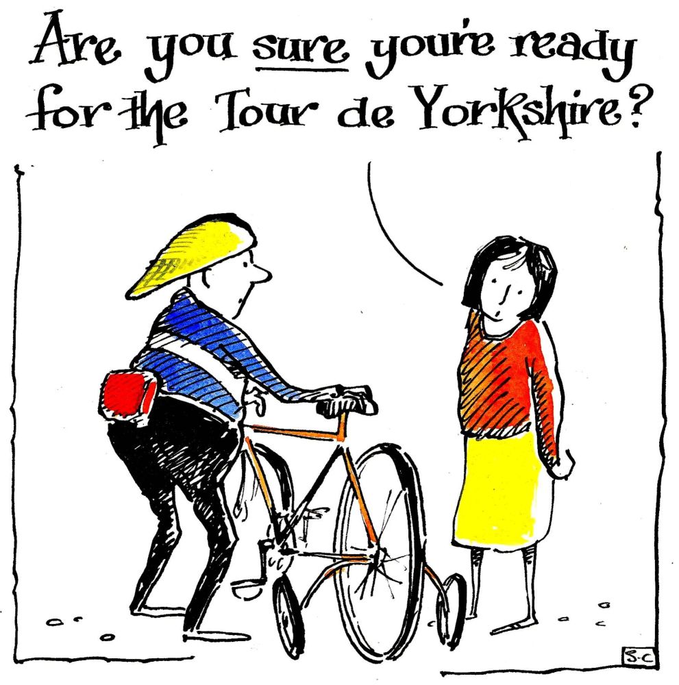 Man with bike & stabilisers woman saying 'Are you sure you are ready for th