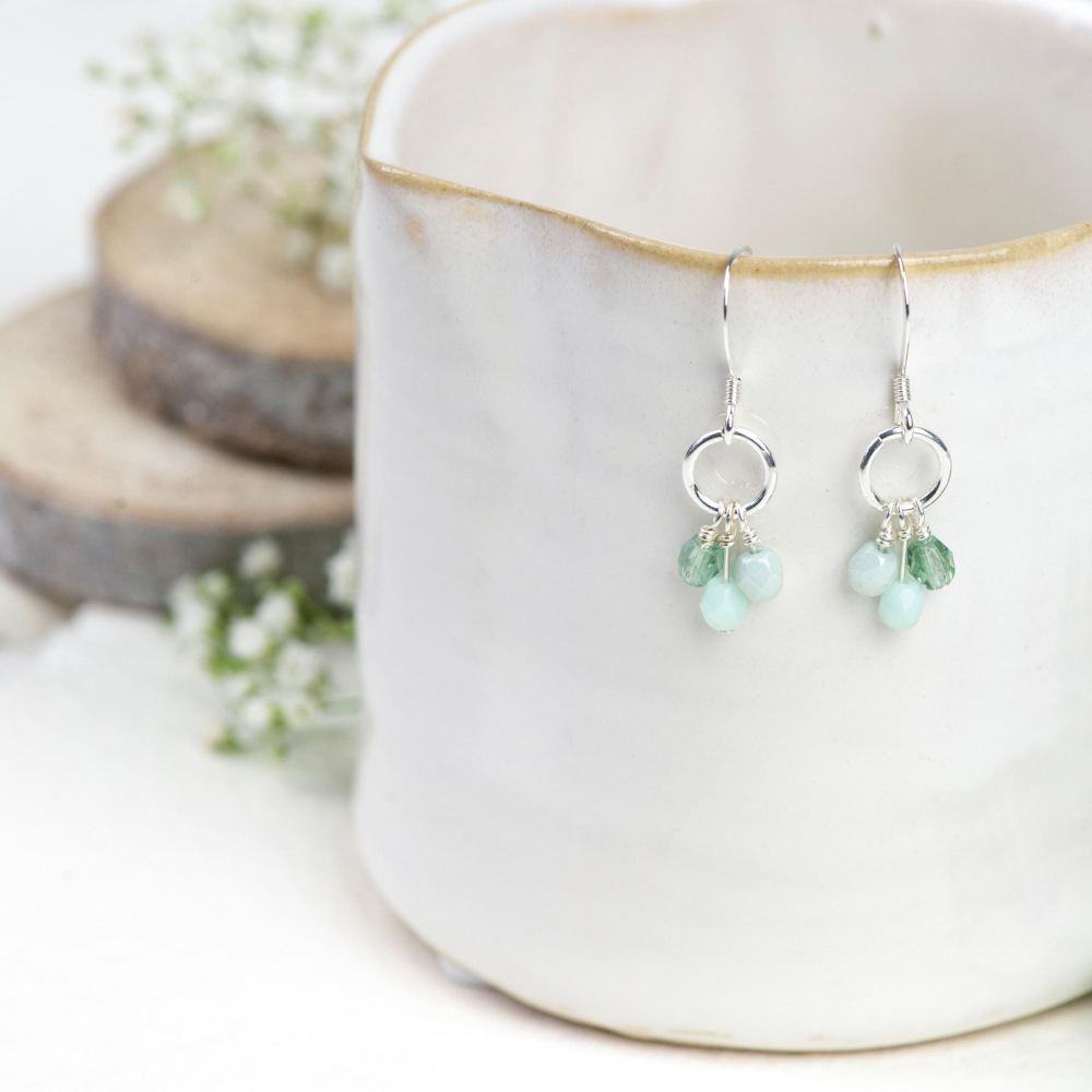 Silver green glass bead cluster earrings