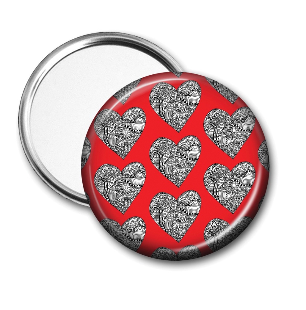 Doodle heart pocket mirror on a red background