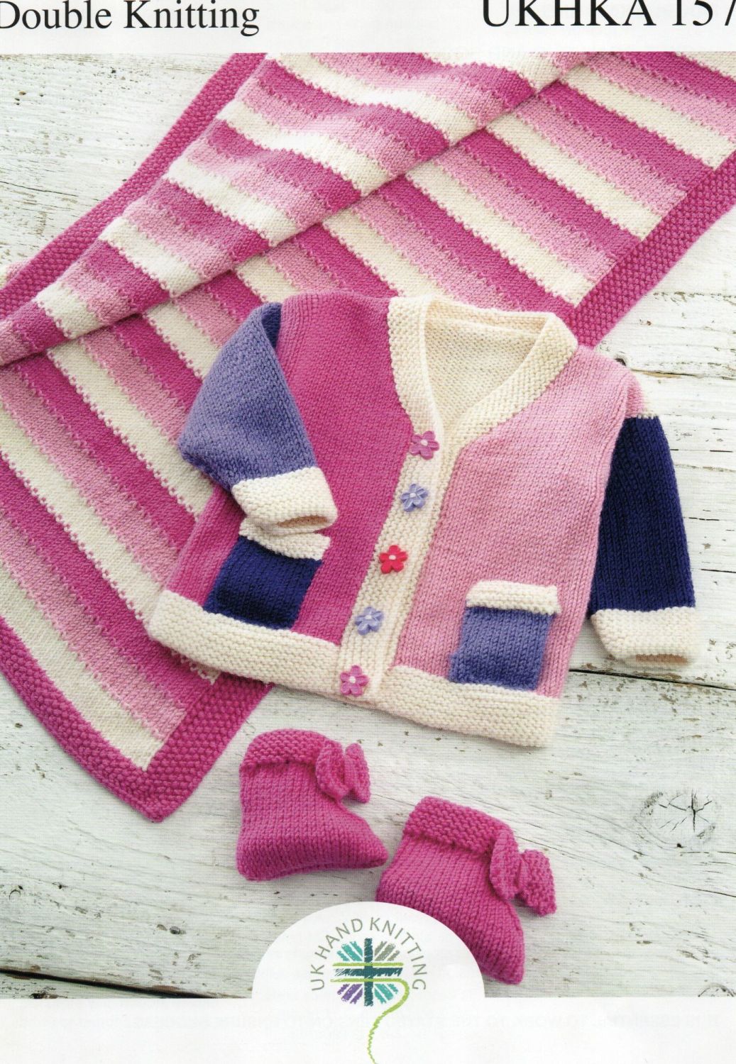 157 - JACKET, PRAM RUG, AND BOOTEES IN DOUBLE KNIT BY UK HAND KNITTING 