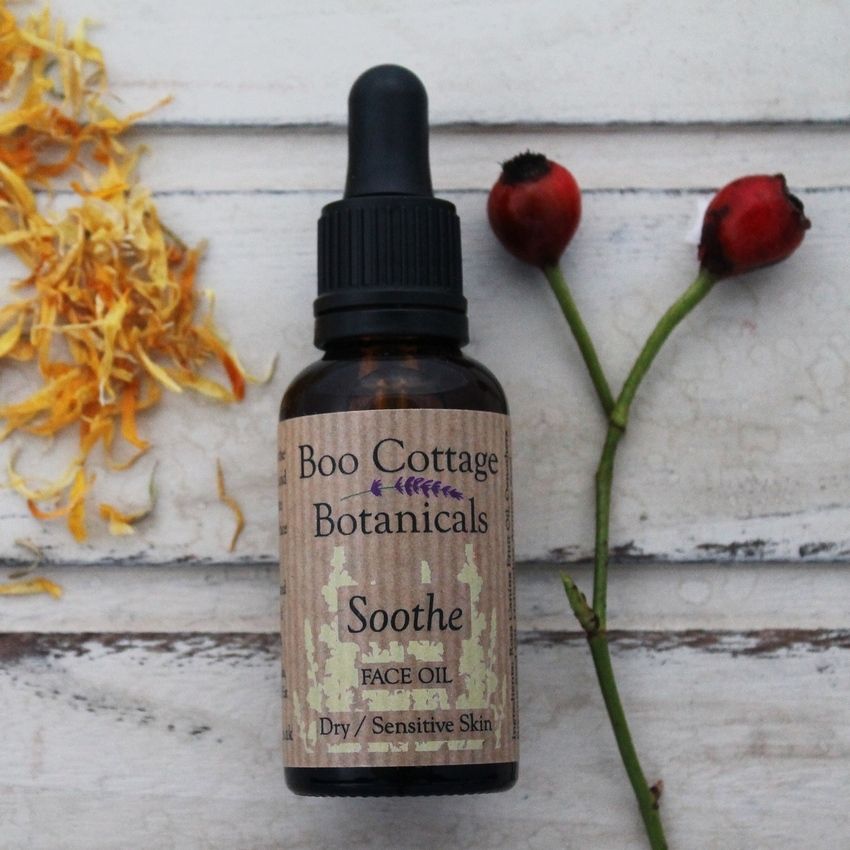 Soothe face oil bottle with calendula and rosehips