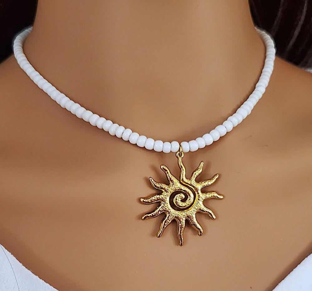 Gold Sunburst Necklace: Spiral Stainless Steel Celestial Pendant, White beaded