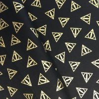 Harry Potter Deathly Hallows Logo Metallic Gold Hogwarts Magical Wizard Witch Cotton Fabric Wizarding World Collection per half metre