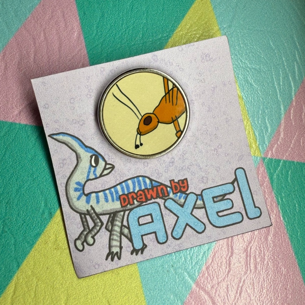 Drawn by Axel - Cricket Pin Badge
