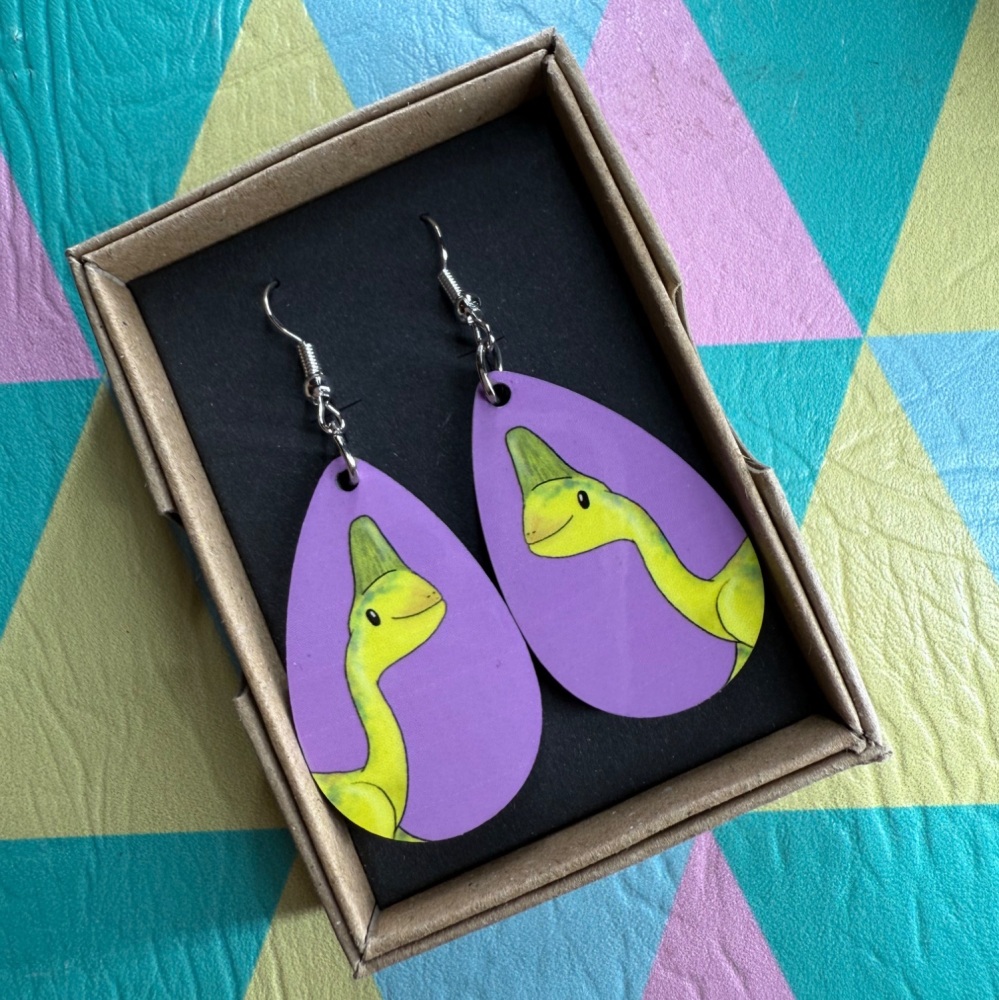 Oviraptor Earrings - Purple