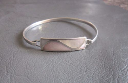 Sterling silver and Mother of Pearl bangle; wave design