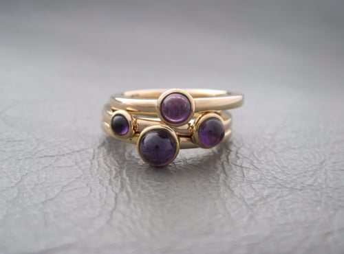 Gilt sterling silver stacking rings set with amethyst