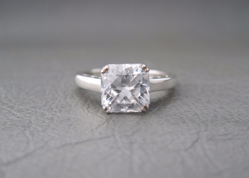Sterling silver proud set square solitaire ring