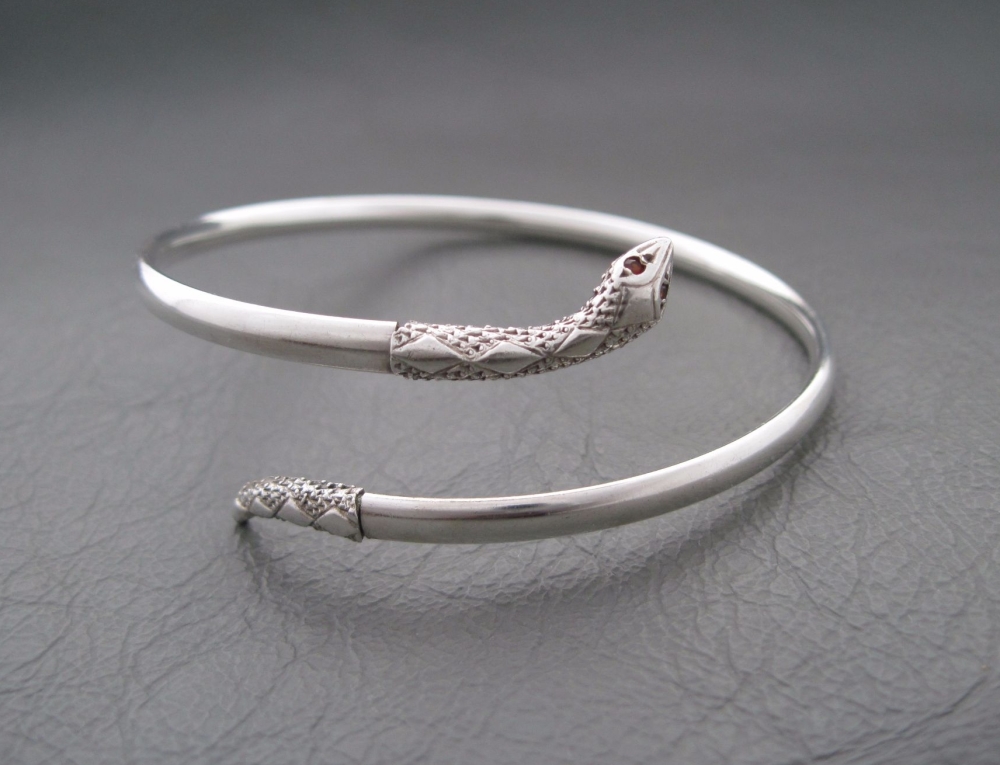 Vintage silver snake wrap bangle with garnet eyes