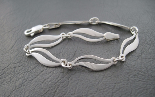 Sterling silver bracelet with split coffee bean panels