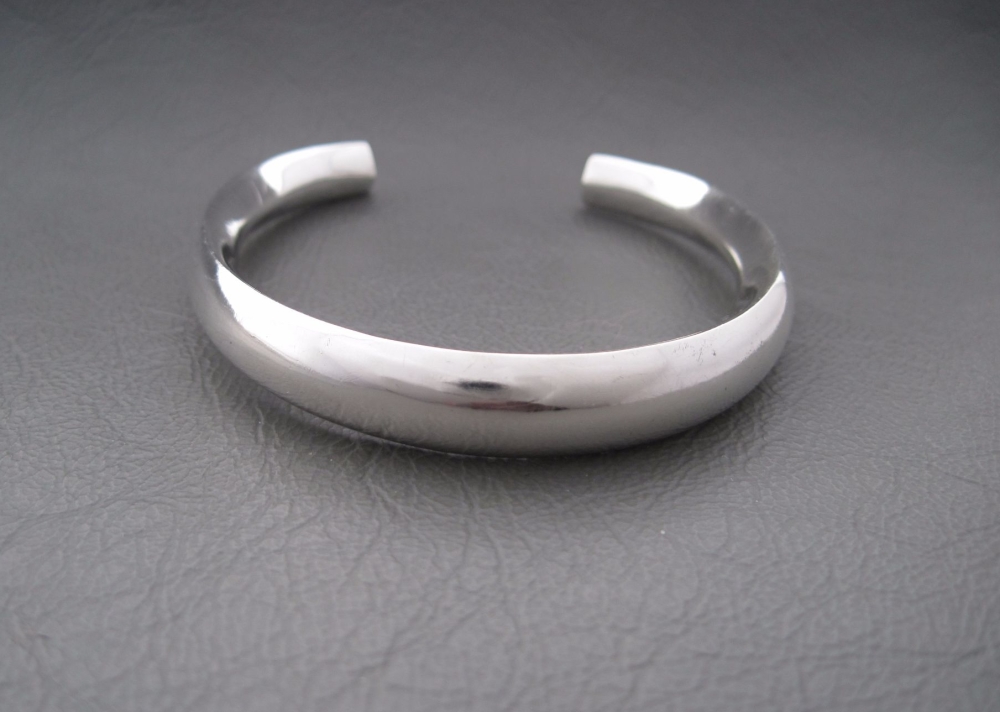 Modernist sterling silver child's rattle bracelet