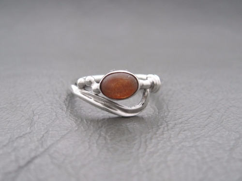 Fancy asymmetric sterling silver sunstone ring