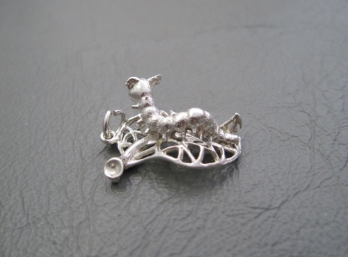 Vintage silver caterpillar on a leaf charm