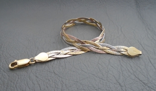 Sterling silver bracelet; plaited tri-colour