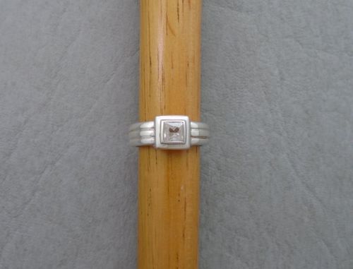 Chunky sterling silver trio band effect square solitaire ring