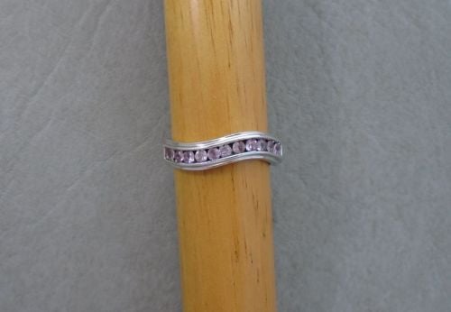 Sterling silver wave ring with pale pink stones