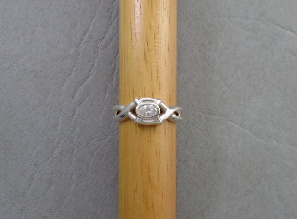 Fancy sterling silver oval solitaire ring