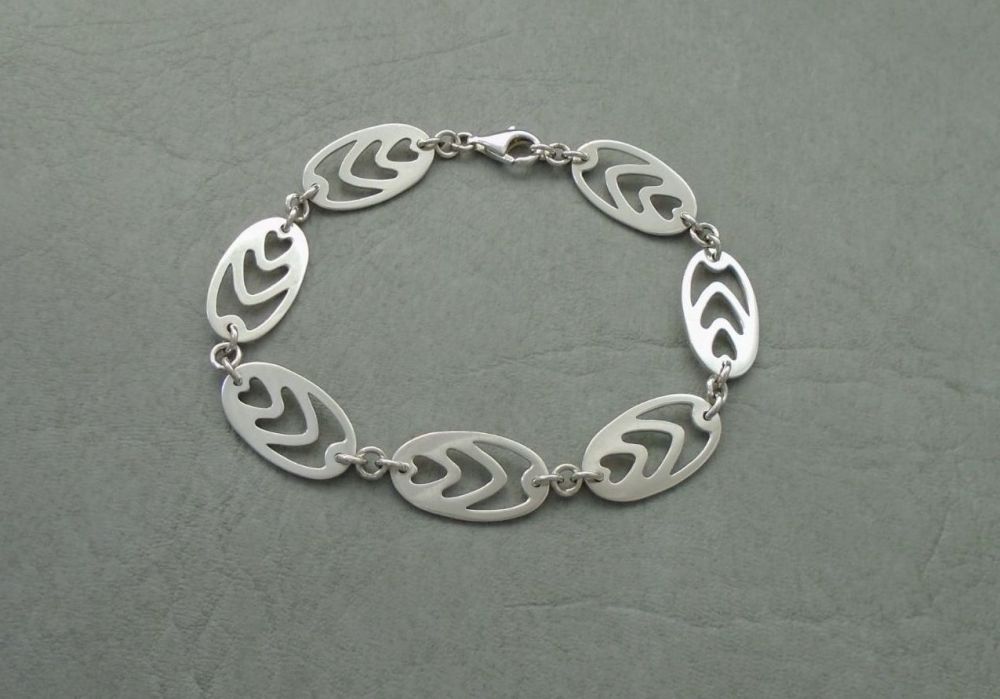 Sterling silver cut-out ovals panel bracelet