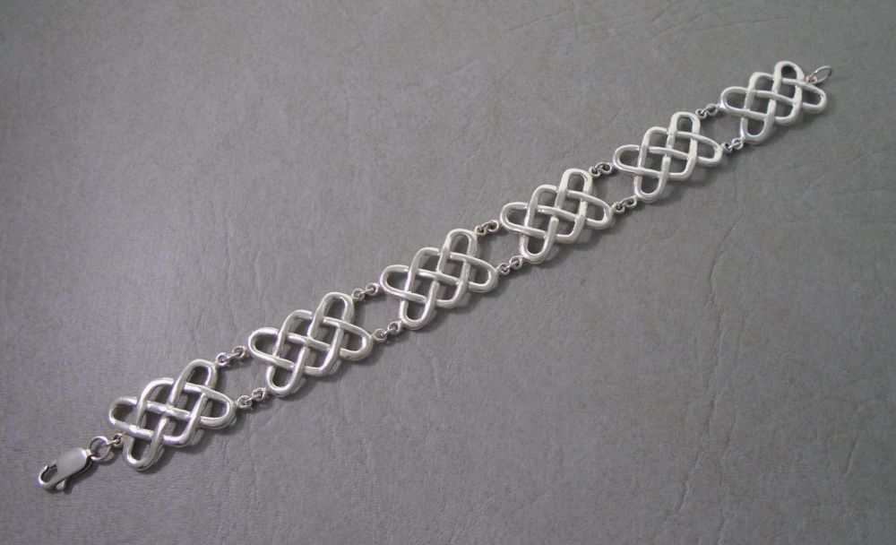 Wide sterling silver celtic panel bracelet