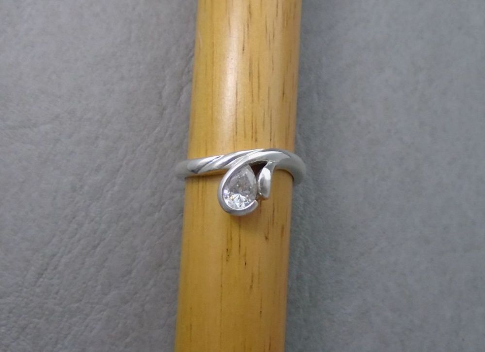 Asymmetric sterling silver pear-cut solitaire ring
