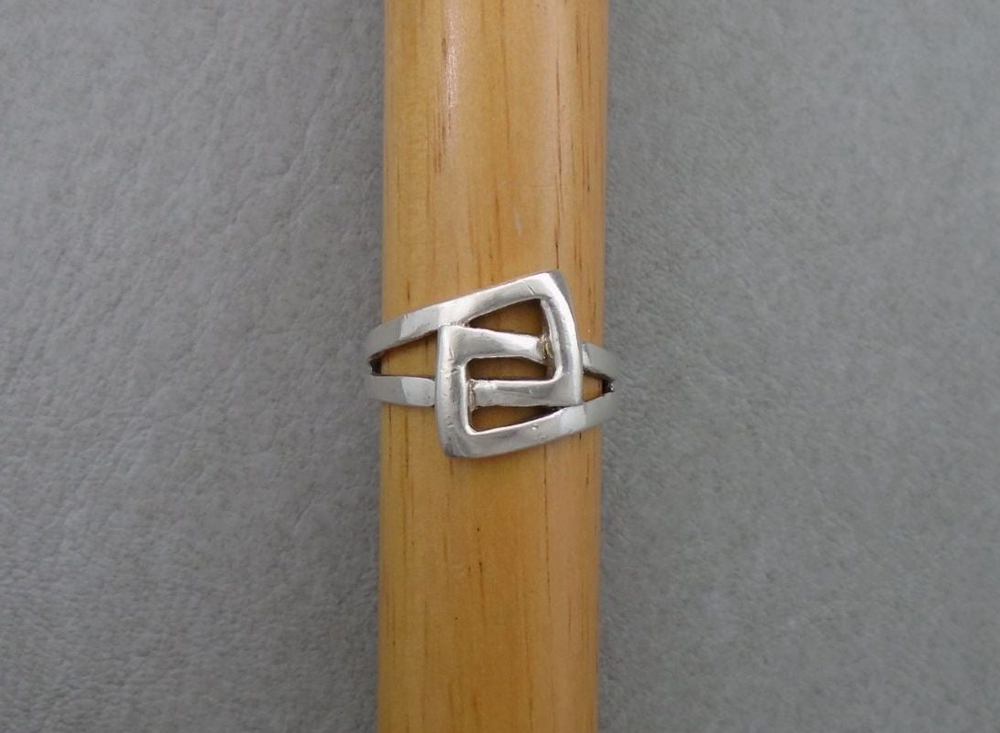 Sterling silver ring in a squared interlocked design