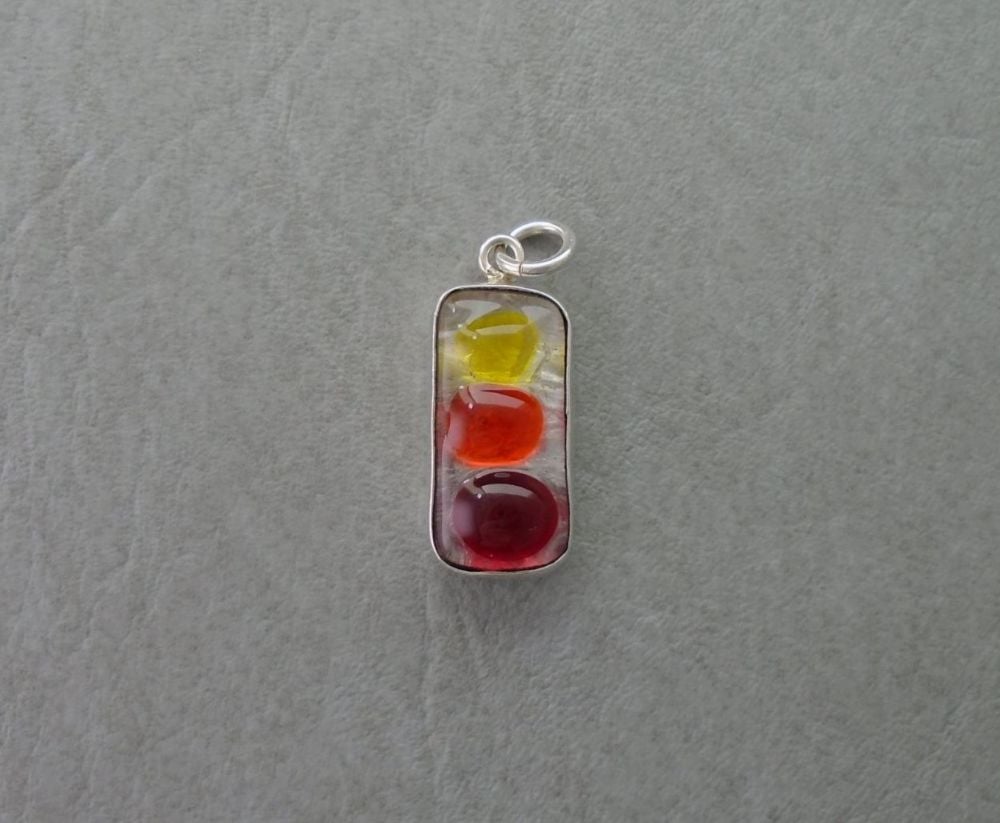 Sterling silver pendant with yellow, orange & red glass