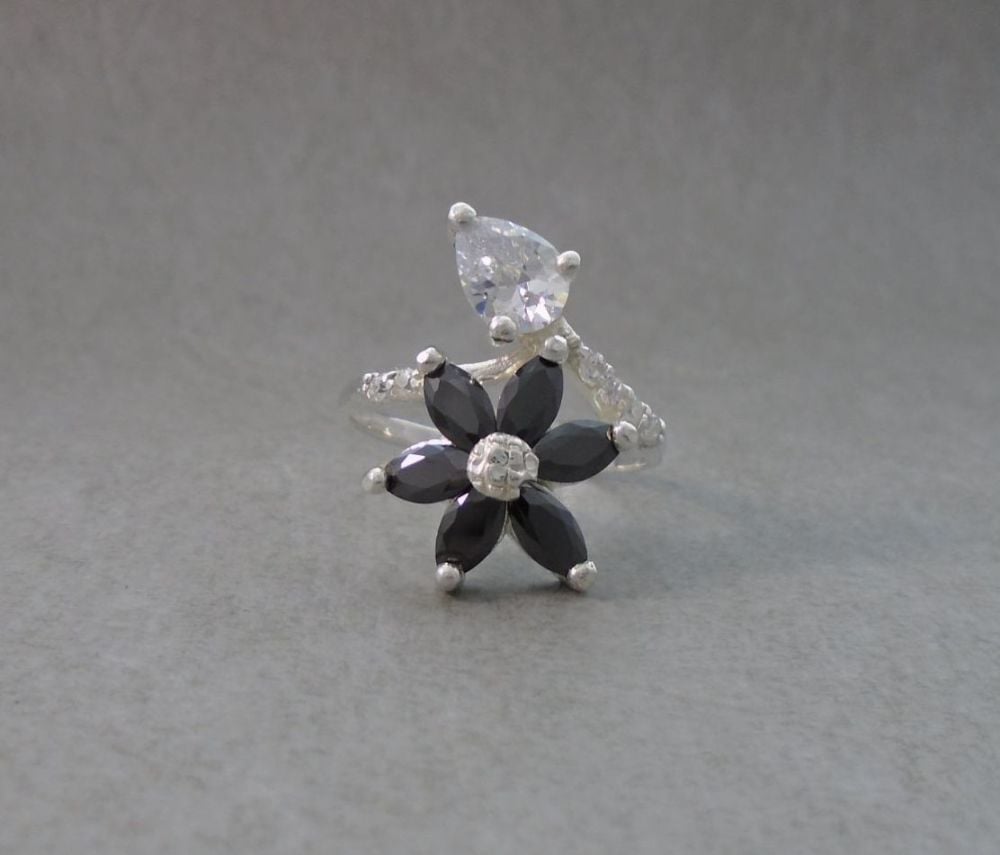 Floral sterling silver ring with black & clear stones