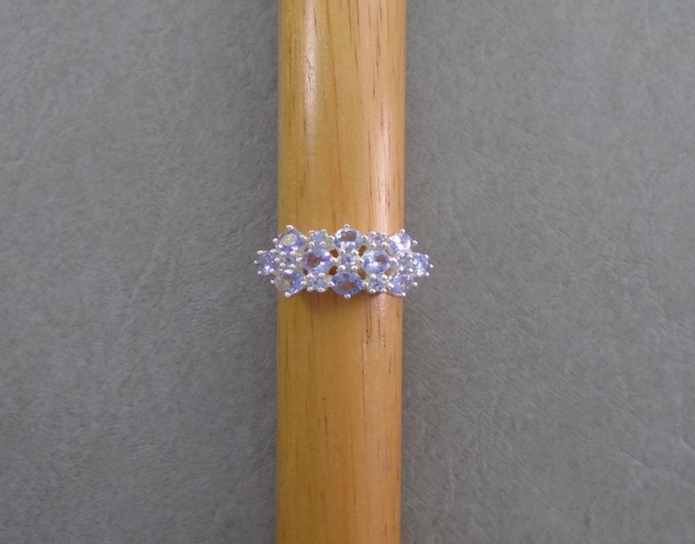 Sterling silver ring with pale amethyst coloured stones