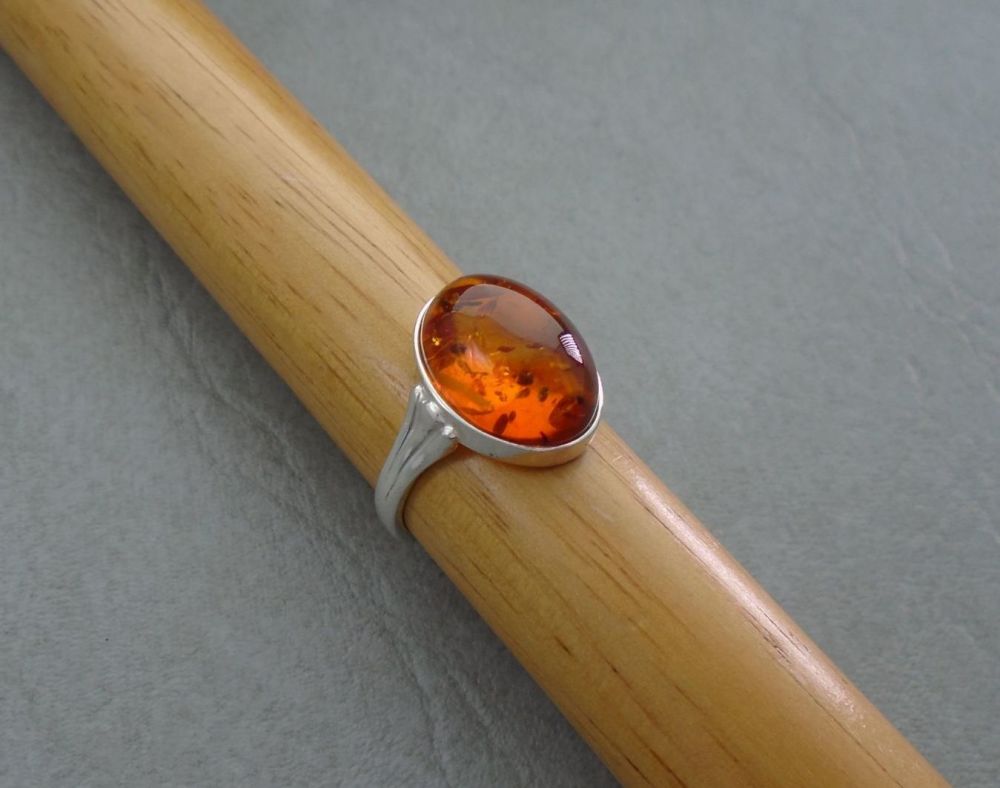 Sterling silver & oval amber cabochon ring