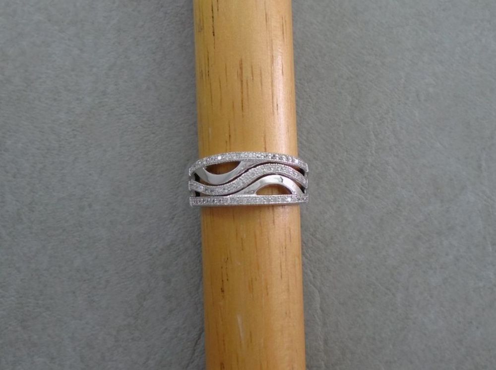 Sterling silver ring with dainty stones & wave detail