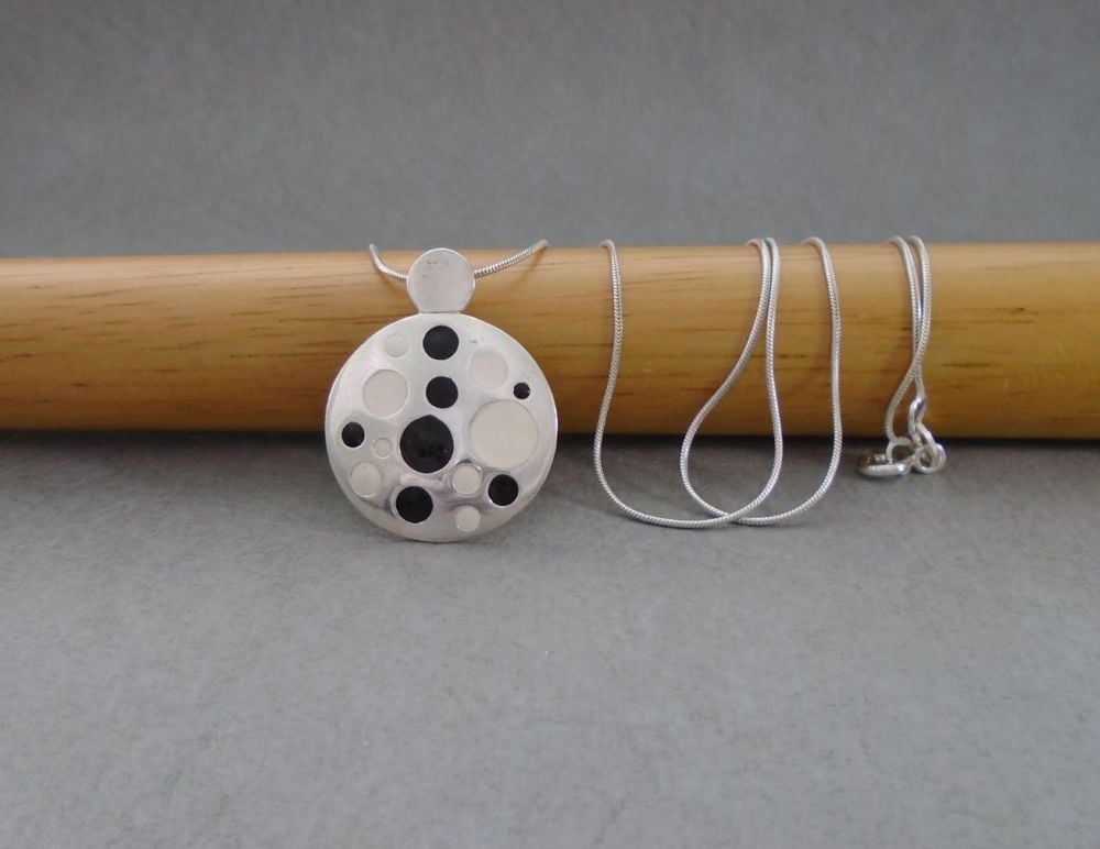 Sterling silver necklace with a black & white enamel spots